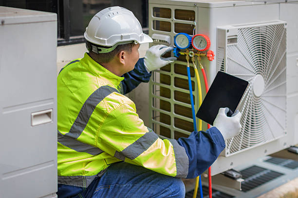 Professional Hvac Maintenance technician working in Elmwood, MA